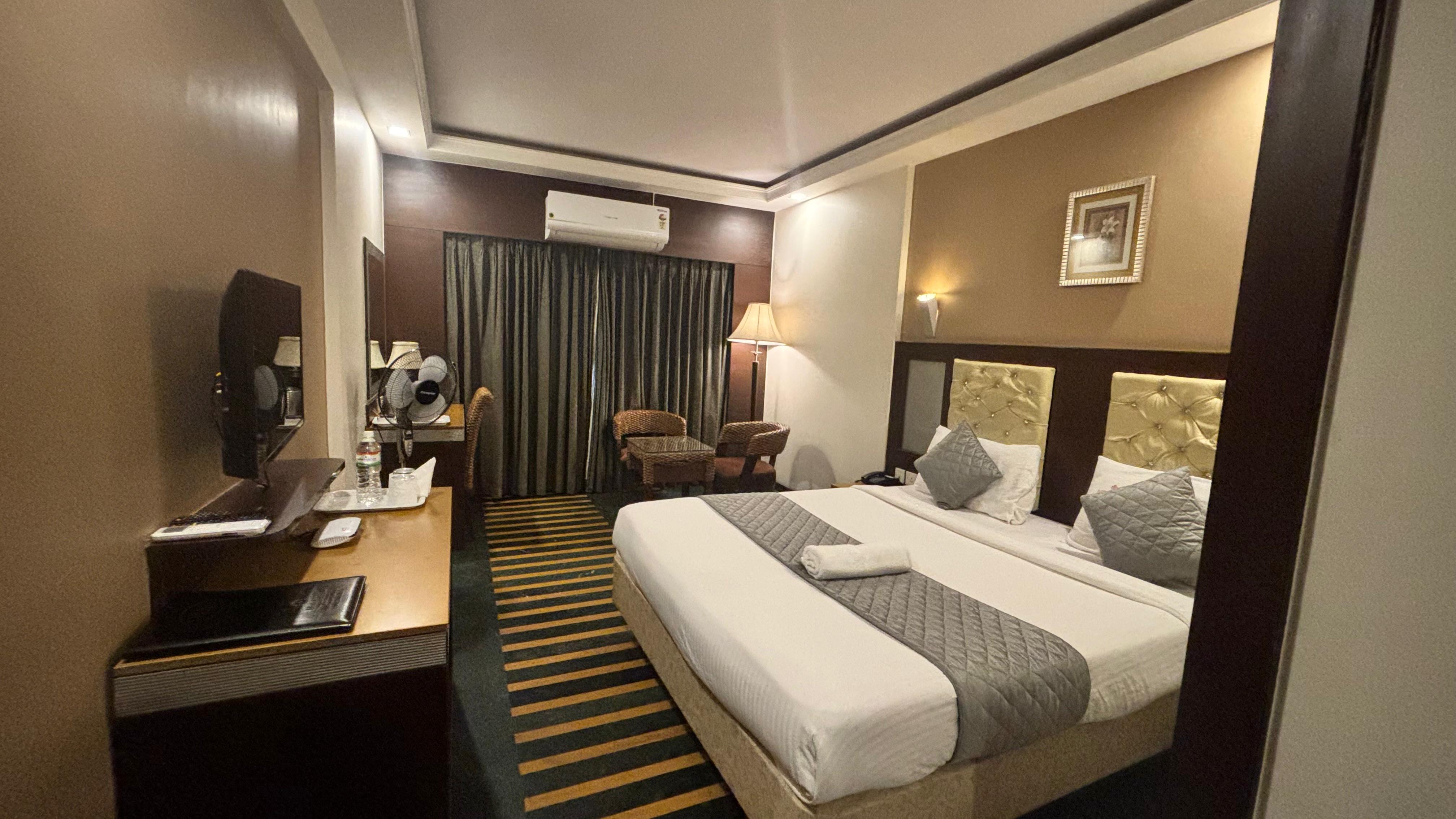Dr. Rajkumar International Hotel - Tap to explore photos
