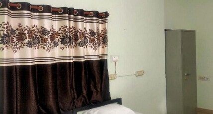 Anand Greens Room Type - Deluxe Room