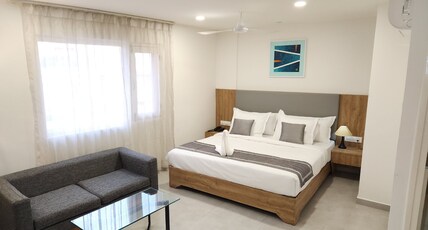 Oasis Suites Room Type - Studio King AC Room
