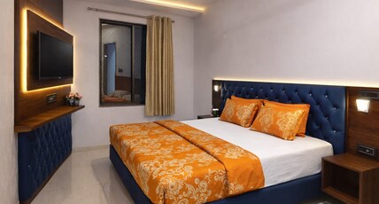 THE SHREE GANESH HOTEL & RESTRO Room Type - TRIPLE BED DELUXE ROOM