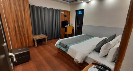 Aamod Feather Touch Room Type - Deluxe Room