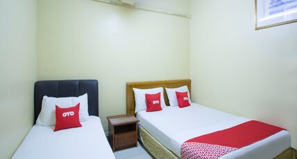 Hotel O Perfect Class Hotel Room Type - Spot on Triple