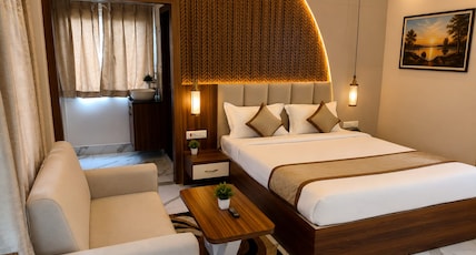 HOTEL VASUNDHARA INN Room Type - Deluxe Room with Balcony HOTEL VASUNDHARA INN Room Type - Deluxe Room with Balcony