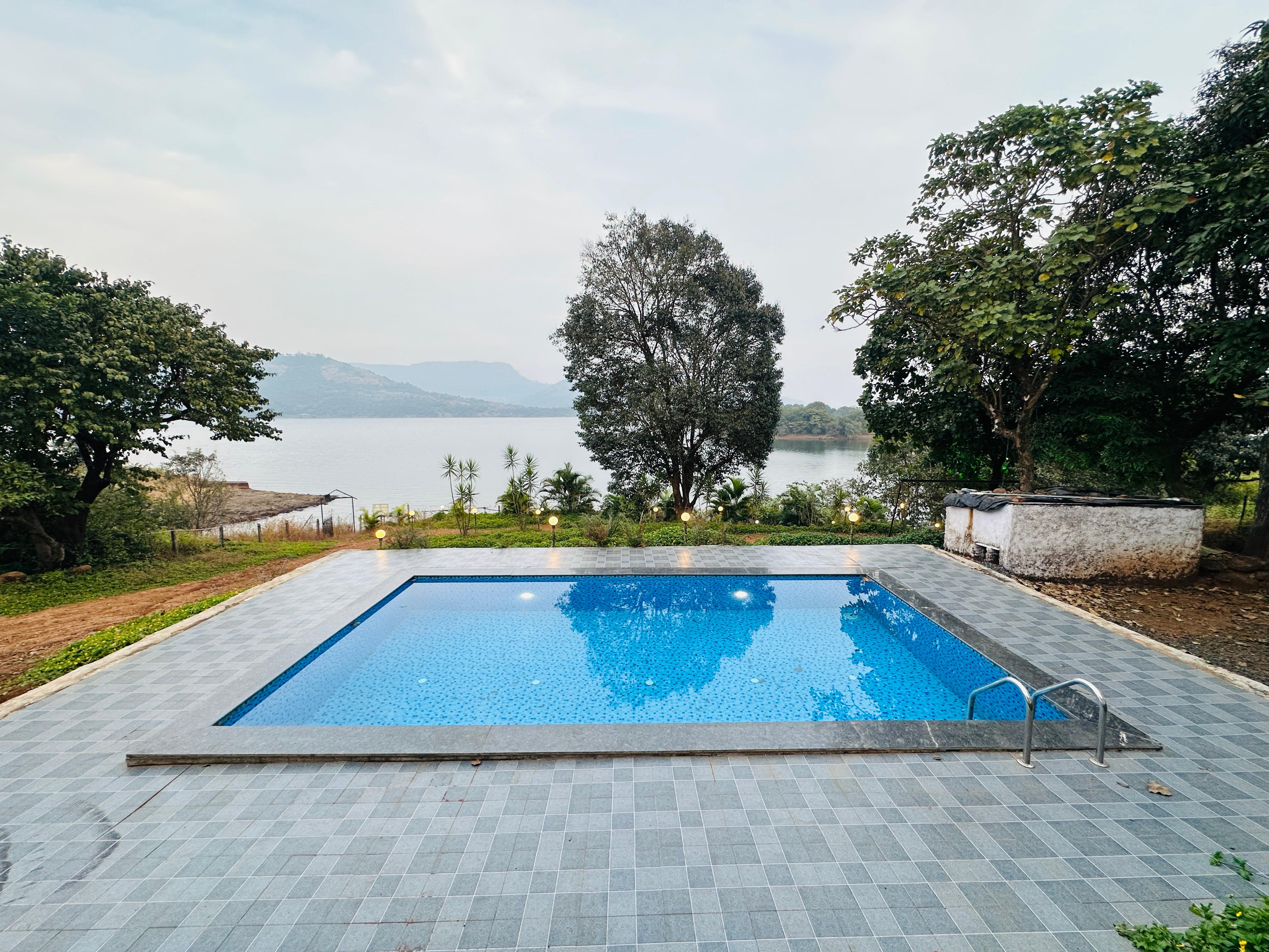 Lake Vibe 3bhk lake-Touch with private pool Pawna Lake Lonavala By The Explorer Stays - Tap to explore photos