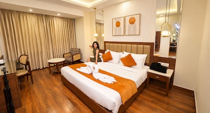 Hotel MJ Grand Inn - Rajpur Road, Dehradun Room Type - Suite Room with Working Desk Hotel MJ Grand Inn - Rajpur Road, Dehradun Room Type - Suite Room with Working Desk