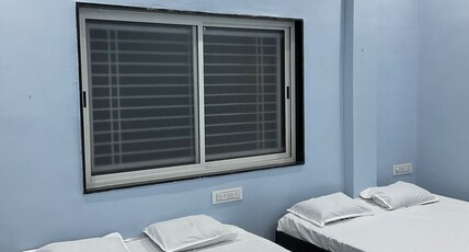 Hotel Shiv Guest House Room Type - Deluxe AC Room Quadruple Bed