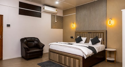 AXOM HOMESTAY & VILLAS Room Type - Super Deluxe Room with Air Conditioning AXOM HOMESTAY & VILLAS Room Type - Super Deluxe Room with Air Conditioning