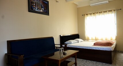 Hotel Sayan Room Type - AC Deluxe Room with Triple Size Bed