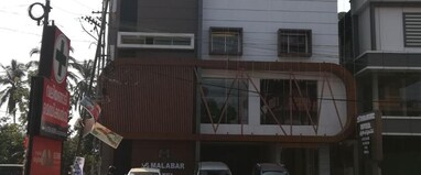 Hotel Malabar Grand & Malabar Restaurant