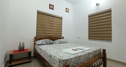 Poonkavanam Gust House Room Type - NON AC DOUBLE ROOM