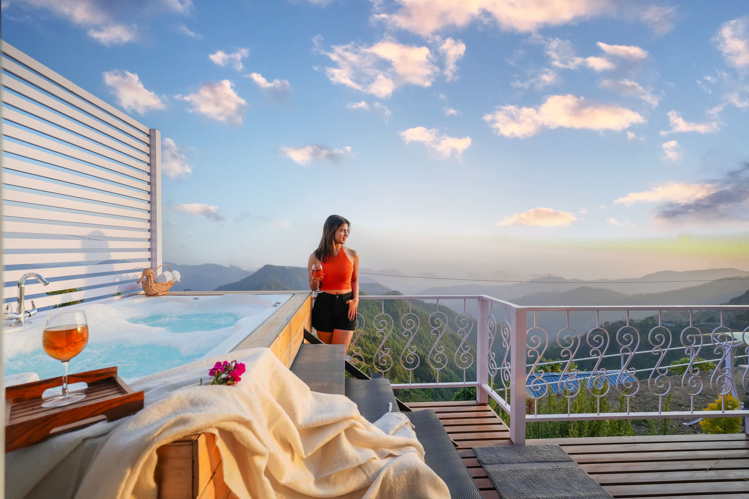 Hilltop Chalet Jacuzzi balcony garden - Tap to explore photos