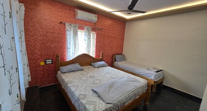 Lakshmi Villa Room Type - Deluxe Triple Room