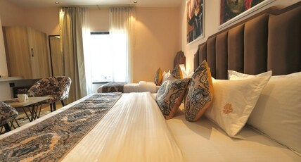 Luxe Stayz Saffron (500 Meters from Golden Temple) Room Type - SUPER DELUXE TRIPLE BED ROOM