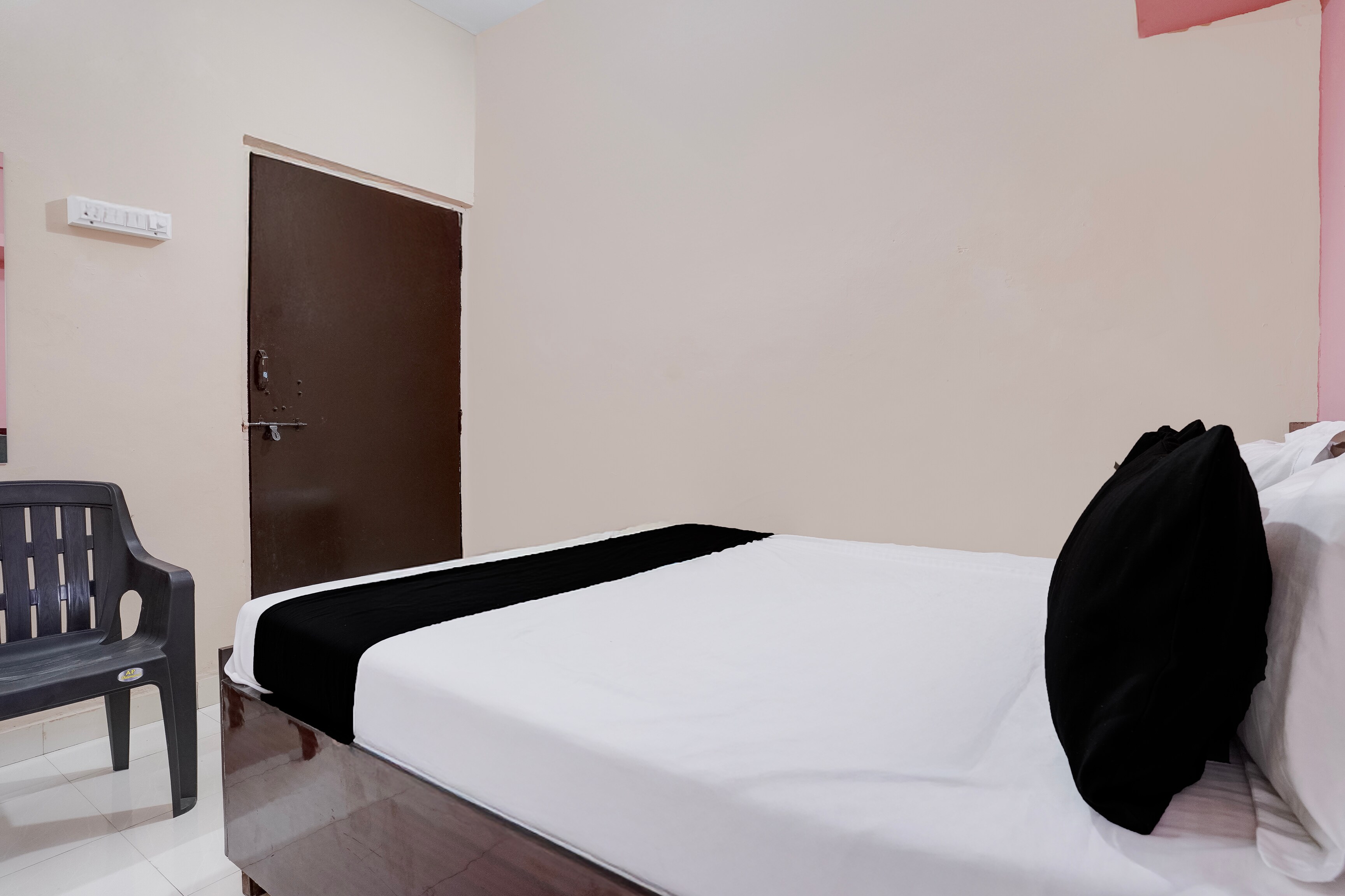 Spot On Shubham Lodging - Tap to explore photos