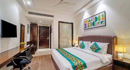 Treebo Premium The Mustard Inn Lawrence Road Room Type - Spacious Deluxe Room with Work Desk and Mini Fridge Treebo Premium The Mustard Inn Lawrence Road Room Type - Spacious Deluxe Room with Work Desk and Mini Fridge