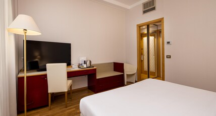 Best Western Air Hotel Linate Room Type - 1 King Bed, Non-Smoking, Superior Room, Wi-Fi, Free Bottle Of Mineral Water, Bathrobe And Slippers Best Western Air Hotel Linate Room Type - 1 King Bed, Non-Smoking, Superior Room, Wi-Fi, Free Bottle Of Mineral Water, Bathrobe And Slippers