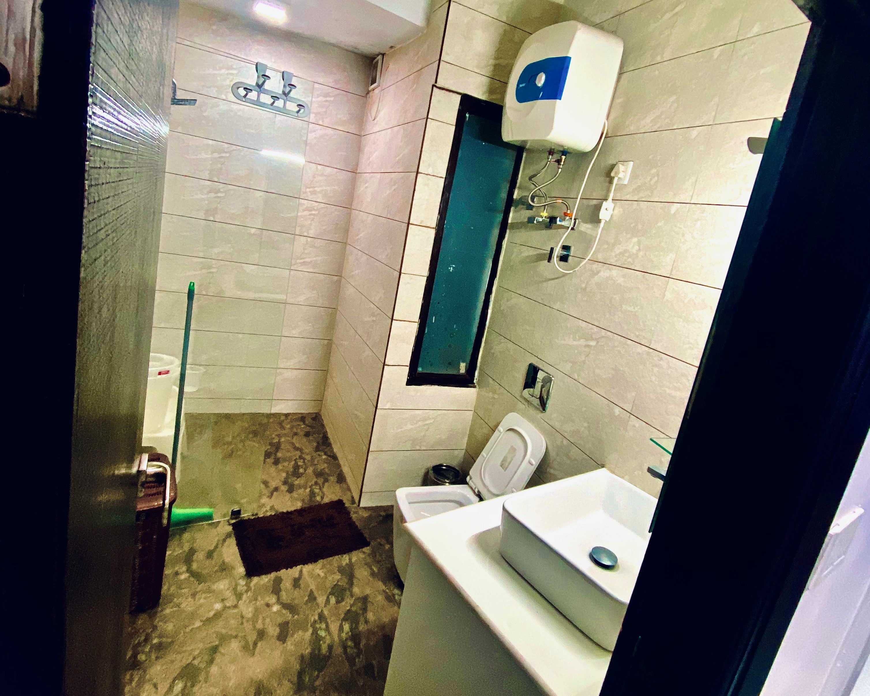 Contemporary Rooms at Parimahal Homestay - Tap to explore photos