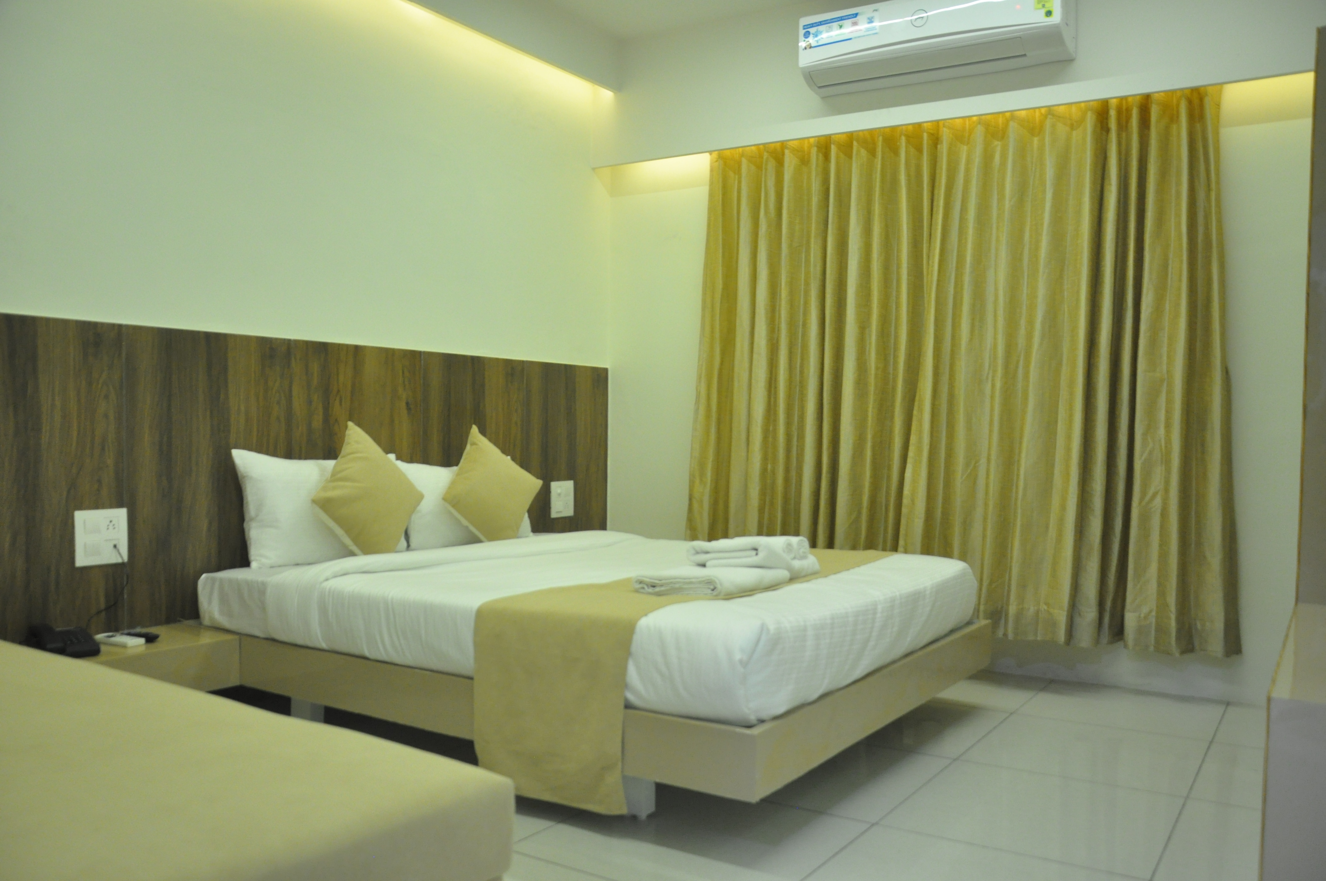 Hotel Dwarkesh - Tap to explore photos