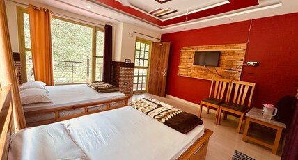 BADRISH HOTEL Room Type - Quad Sharing Deluxe Room