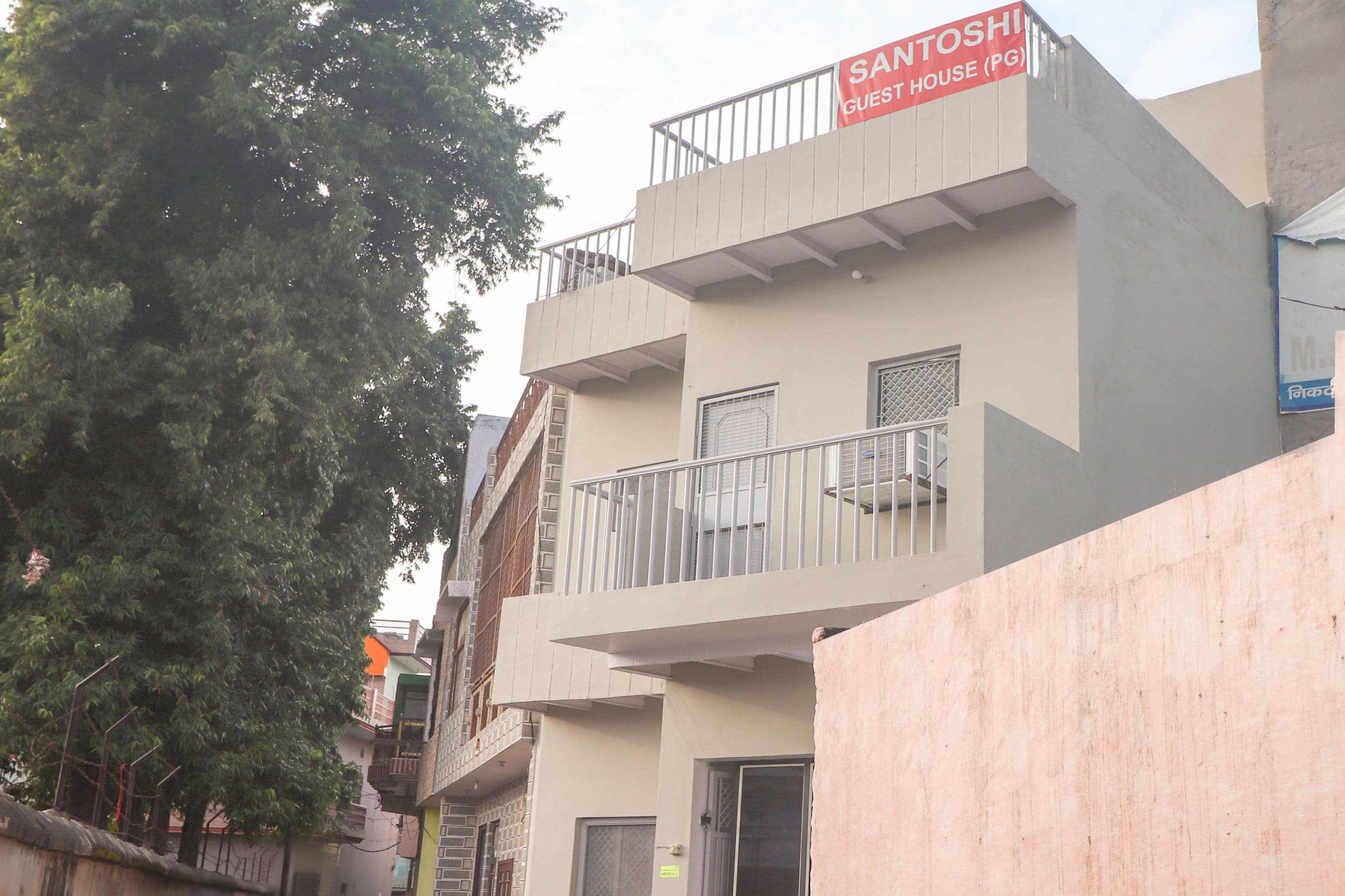Hotel O Santoshi Guest House Khurja City Railroad Station - Tap to explore photos
