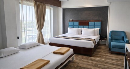 Hotel Carnival Pure Veg Room Type - Family 4-Bed AC Room