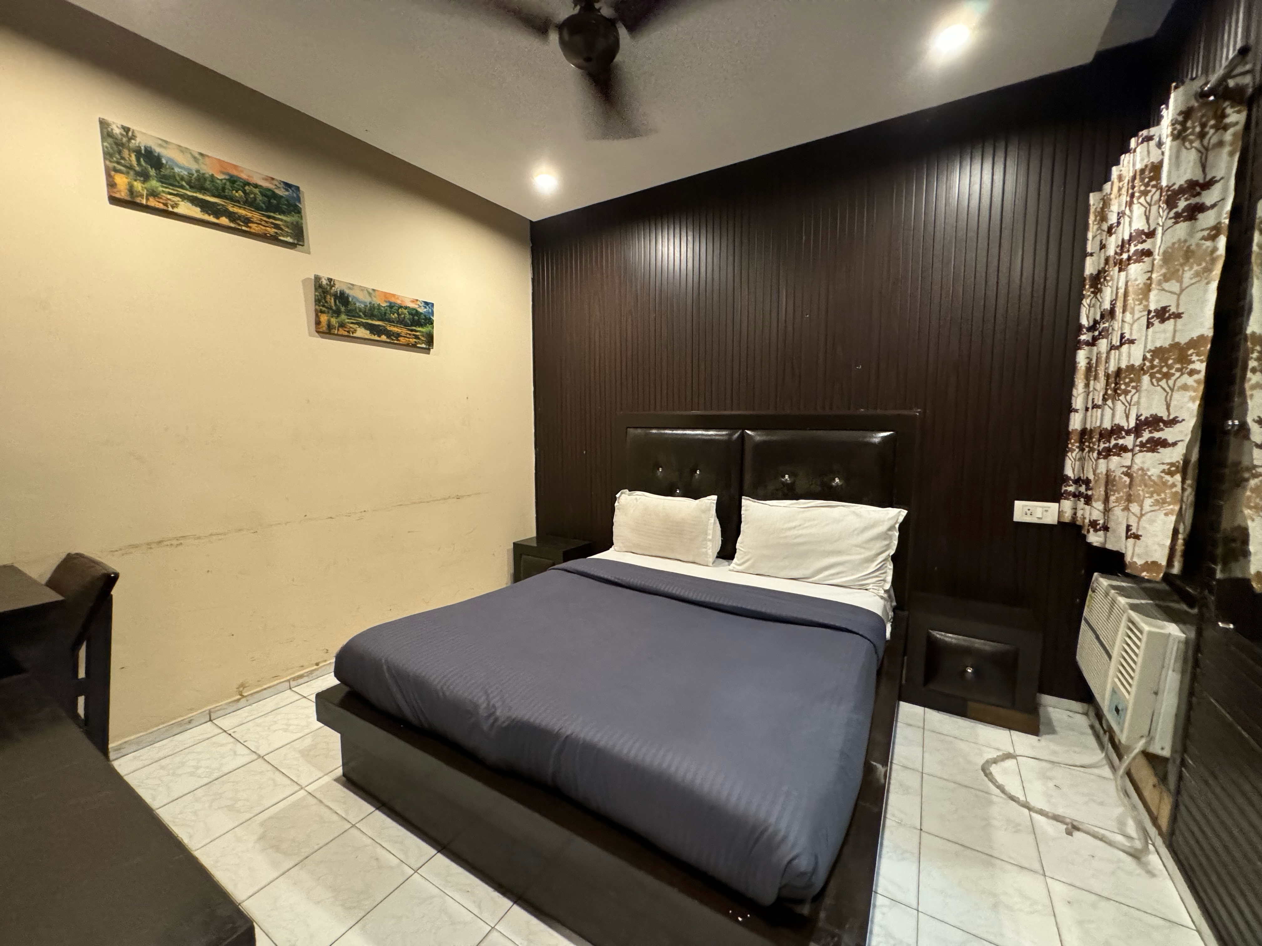Hotel Trishul By T And M Hotels - Tap to explore photos