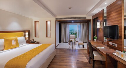 BloomSuites | Ahmedabad Room Type - Deluxe Double