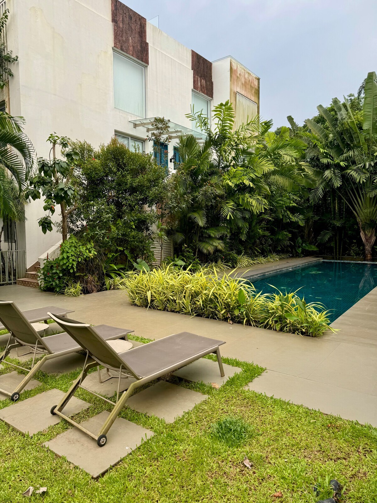 Designer 2BHK duplex Apt w/ Rooftop & Pool by Savera Stays - Tap to explore photos