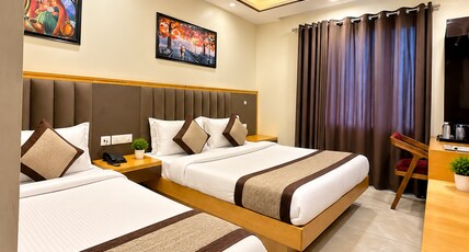 Hotel Aman Imperial Just Near New Delhi And Connaught Place Room Type - Premium Triple Room with City View