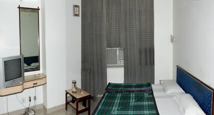 HOTEL LANDMARK Room Type - Deluxe Room AC -UN MARRIED COUPLES NOT ALLOWED
