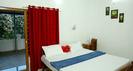 THEKKADY HOMES Room Type - Deluxe Room  2