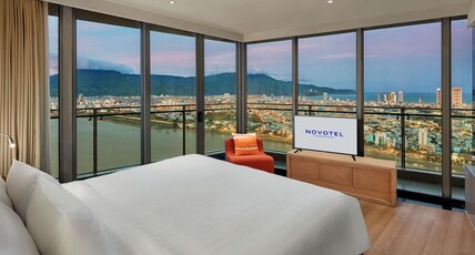 NOVOTEL DANANG PREMIER HAN RIVER Room Type - Novotel Suite, balcony, Han River view, bathtub, and Premier Lounge Access- 1 king bed, 56 m2 NOVOTEL DANANG PREMIER HAN RIVER Room Type - Novotel Suite, balcony, Han River view, bathtub, and Premier Lounge Access- 1 king bed, 56 m2