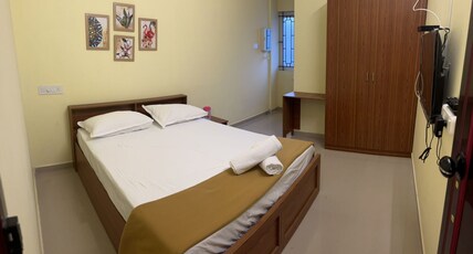 SURATHI ENCLAVE Guest House Room Type - SERENE SUPER DELUXE ROW VILLA