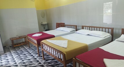 Kubera Rooms and restaurant Room Type - Deluxe 6 Bedded AC Room with Kitchen