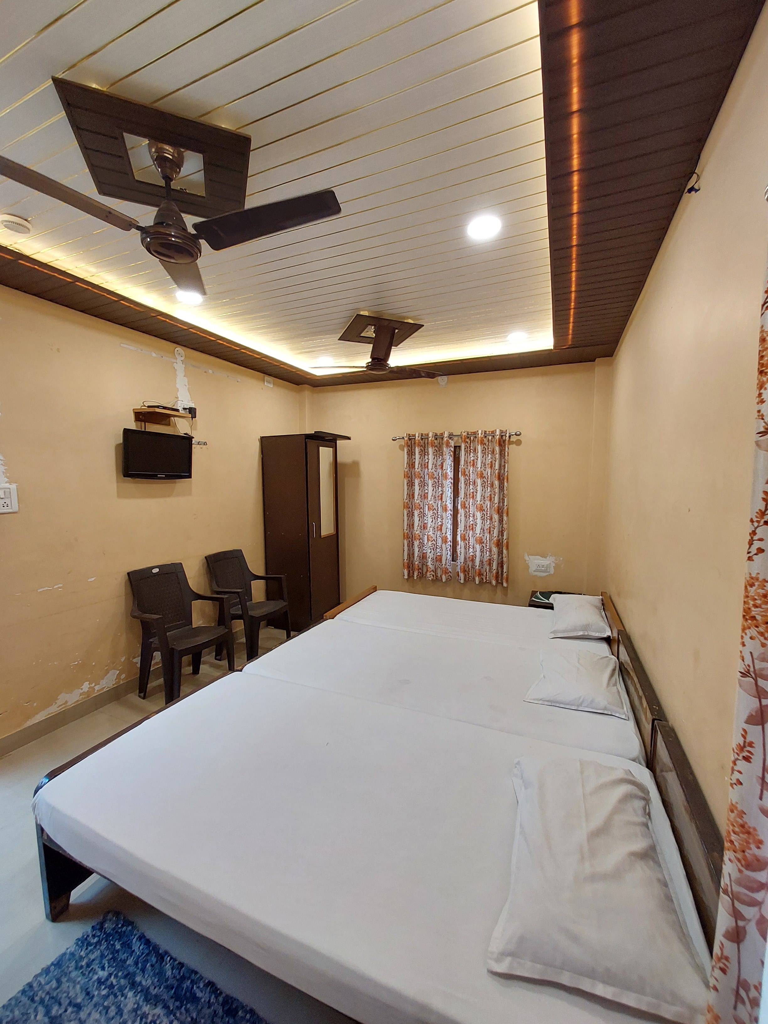 Teerth Guest House - Tap to explore photos