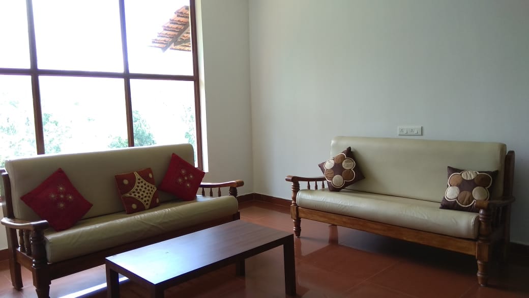Coorg Heritage Inn | Rooms & Caretaker - Tap to explore photos