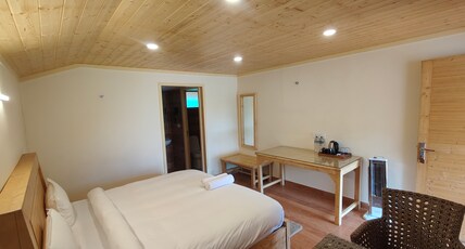 The Auli Meadows Room Type - Executive Room with Mountain View ( Heated Bedding )