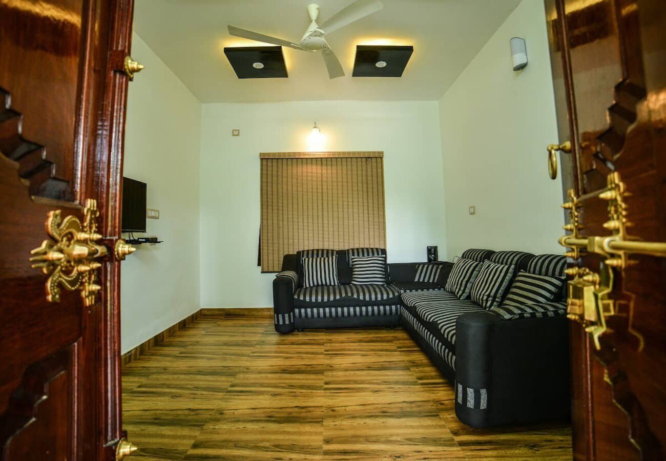 Amritham Holidays | Rooms & Wi-Fi - Tap to explore photos