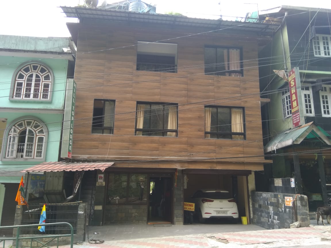 Yuvaan Service Apartment - Tap to explore photos