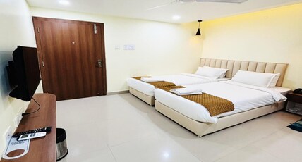 RASIKA HOTEL AND RESTRO Room Type - Deluxe Room