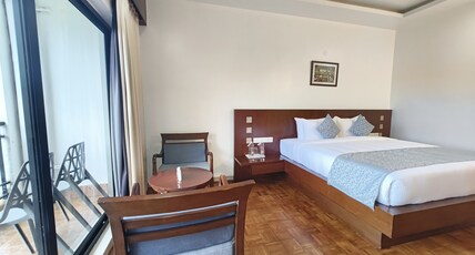 RNS ONE Room Type - Premium Rooms AC with Balcony