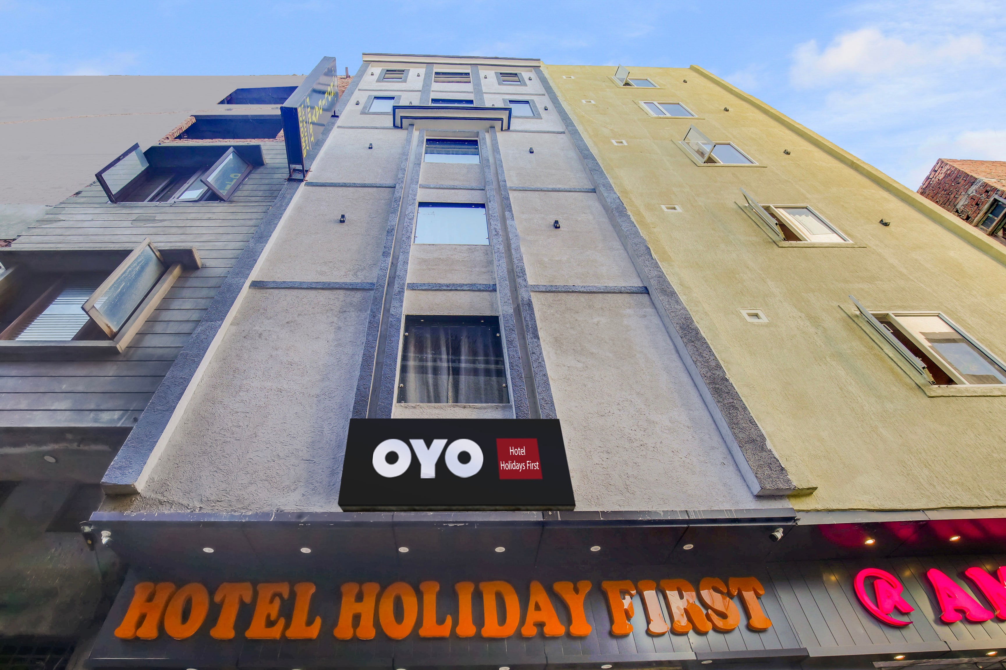 Hotel O Holiday First - Tap to explore photos