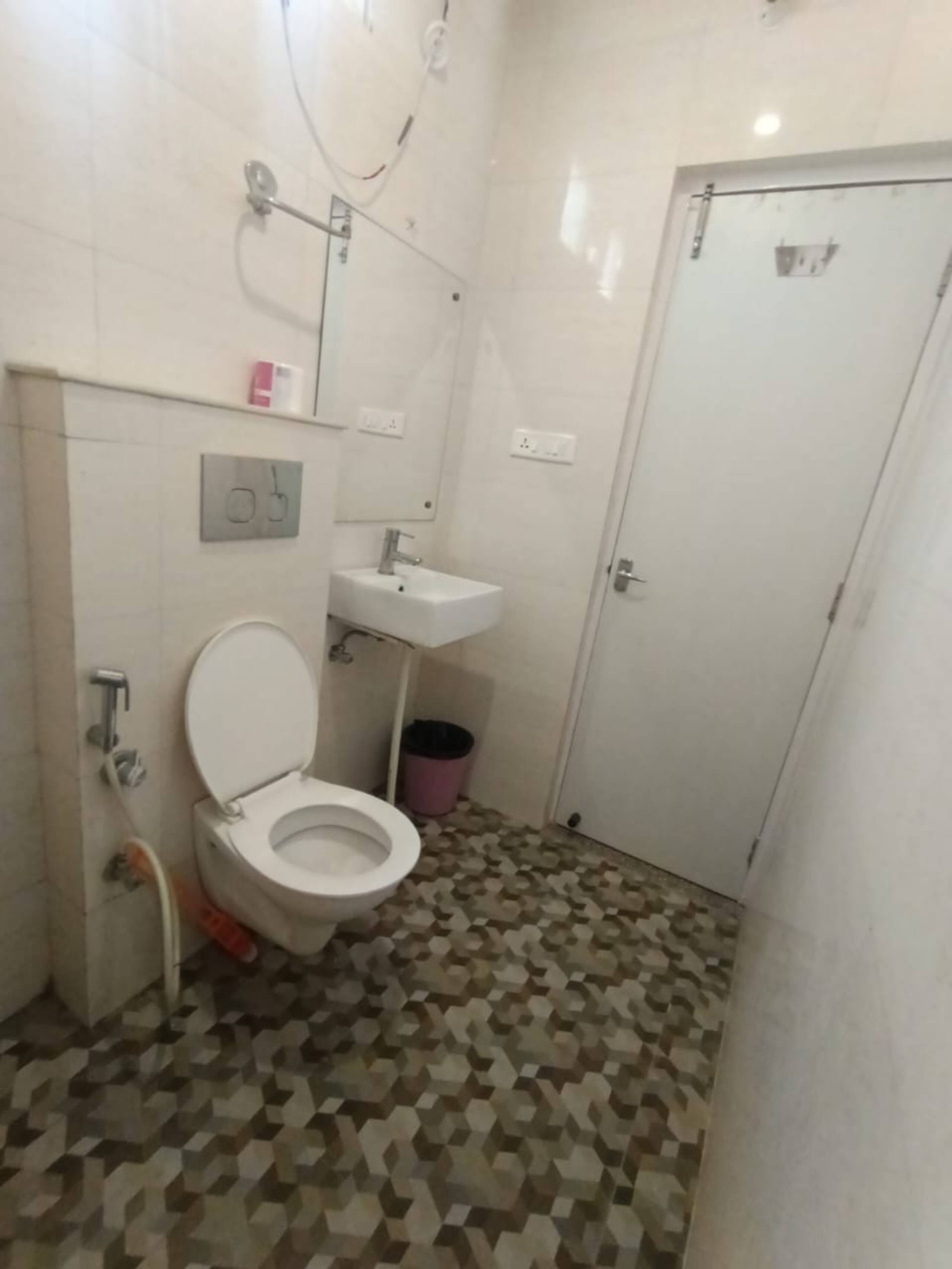 Premium AC Double Room - Tap to explore photos