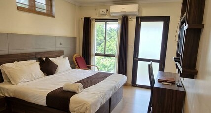 Aarogyamantra Room Type - Deluxe Room with Garden View