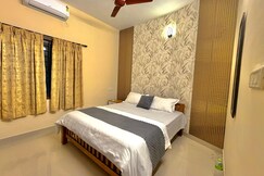 Orchid Homes Cozy City 2BHK Retreat Near Lulu Mall