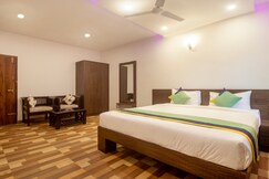 Treebo Elite Plaza, 700 Mtrs From Madikeri Fort