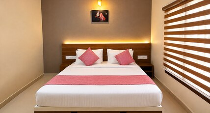 Madhura Residency | 6-Min Walk to Padmanabhaswamy Temple Room Type - Standard Room
