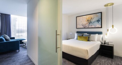 MERCURE CANBERRA BELCONNEN Room Type - Executive King Studio, with separate lounge and sofa bed bath and separate shower MERCURE CANBERRA BELCONNEN Room Type - Executive King Studio, with separate lounge and sofa bed bath and separate shower