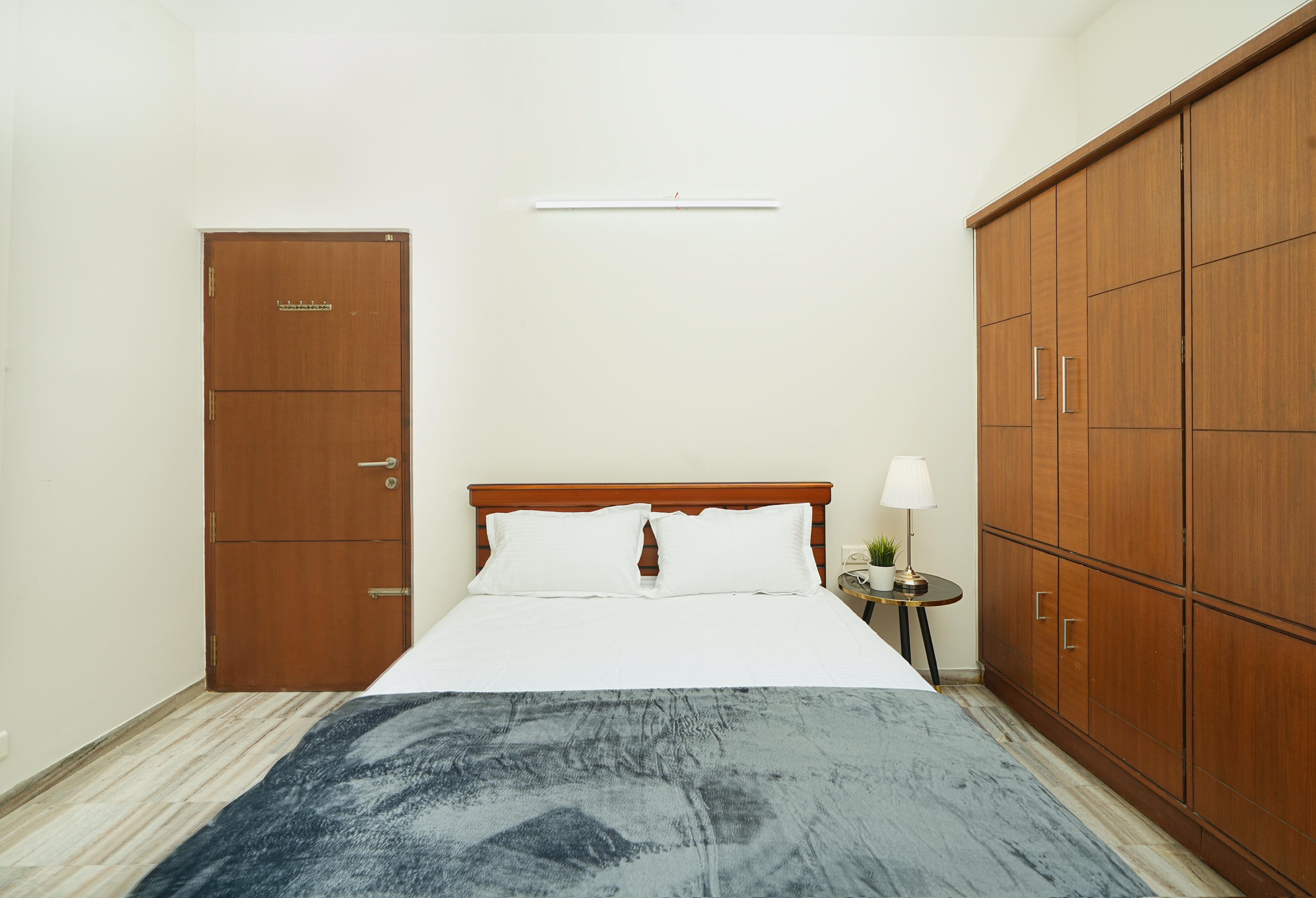 Stayzin Service Apartments - Tap to explore photos
