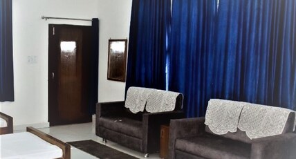 Krishnam Guest House Room Type - Family Room with Four single beds